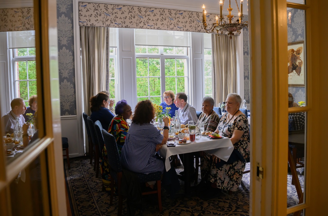 Friends enjoy the tea from the Music Room