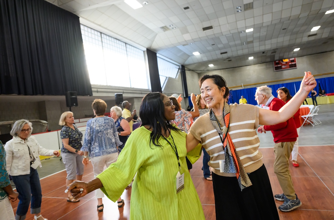 Maxine Samuels and Min Wan lead the dancing at this year's QCC Gathering.